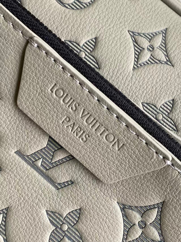 TRIO MESSENGER 25 IN GRAY MONOGRAM SHADOW CALFSKIN