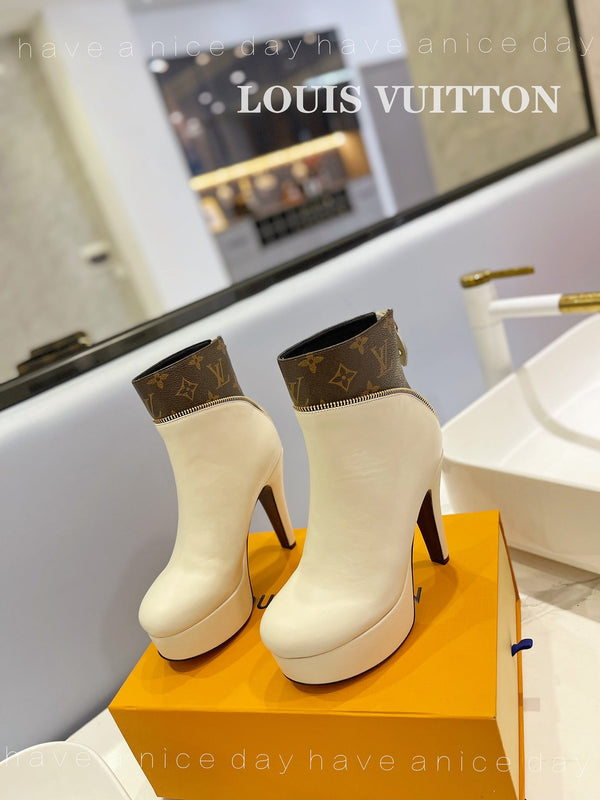 LV Afterglow Boot 10.5 Cream Cowhide Monogram Canvas