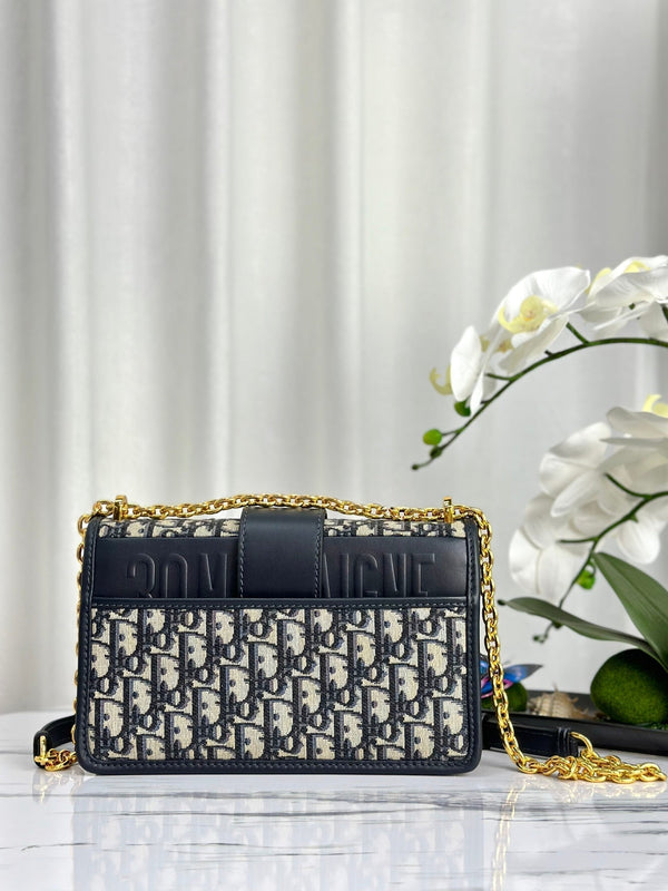 MONTAIGNE 25 BAG IN BLUE OBLIQUE JACQUARD