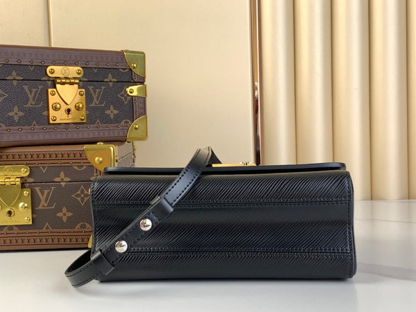 TWIST MM 23 IN BLACK EPI LEATHER GOLD AND SILVER HARDWARE