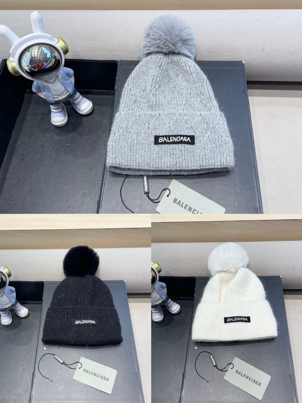 Balenciaga Knitted Hat with Pom-Pom 436967