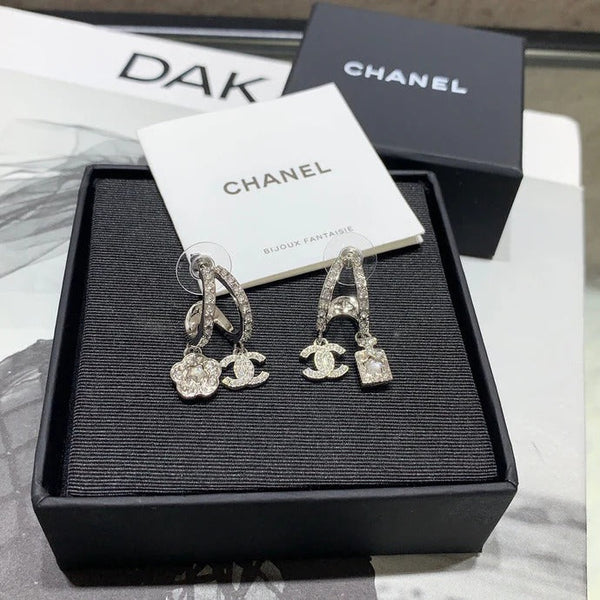 Chanel Silver Asymmetrical Earrings