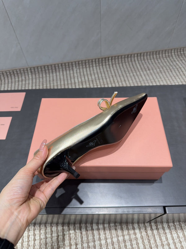 Miu 26s Pointed Toe Pumps 55mm In Gold Calfskin With Bow