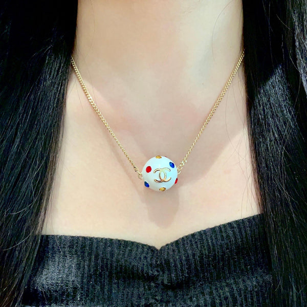CC 26s Double C Logo White Enamel Crystal Ball Pendant Necklace In Gold Metal 629889