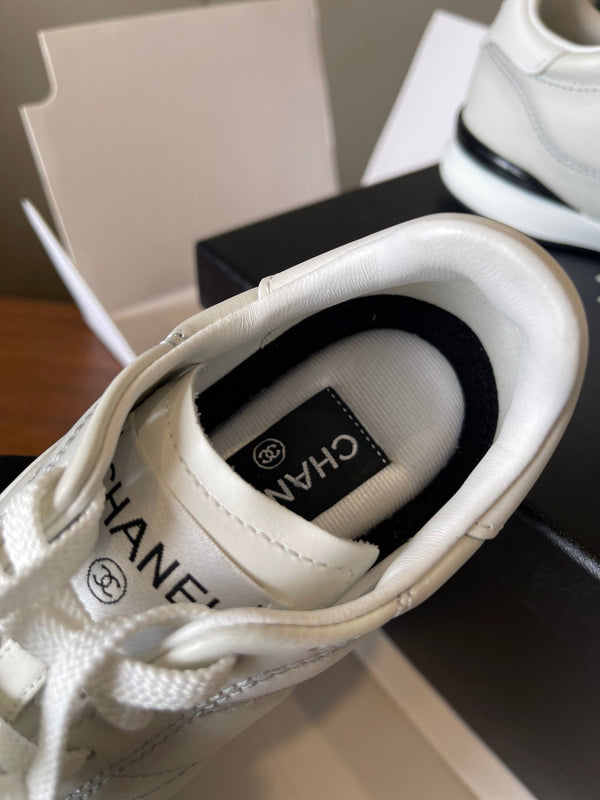 CC 26ss Low-Top Sneaker Ivory Leather 623165