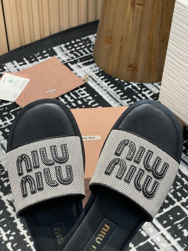 Miu 25S Beige and Black Canvas and leather slides 227133