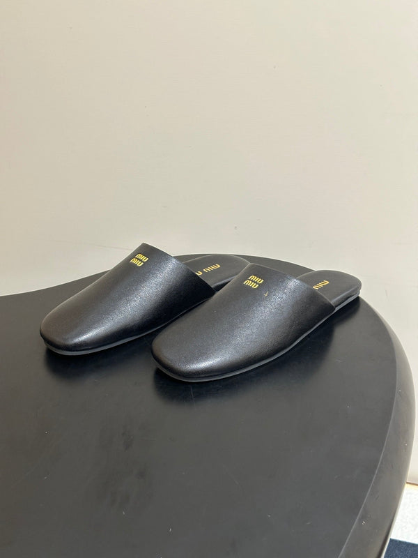 Miu Miu 2026 Flat Closed-Toe Mule Black Cowhide 994104