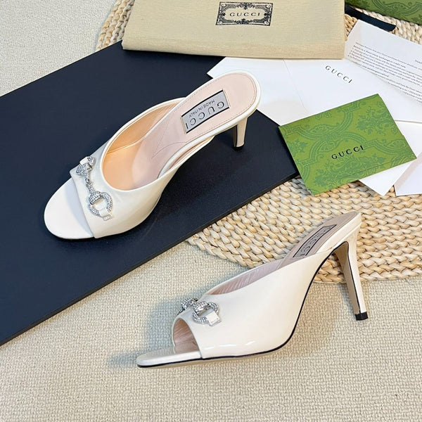 GG Women's Horsebit mid-heel slide sandal in glossy White leather