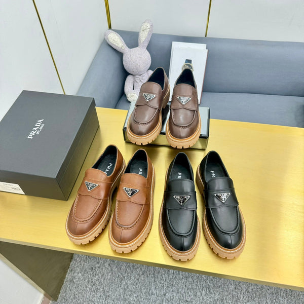 LOAFER WITH TRIANGLE LOGO IN COGNAC CALFSKIN