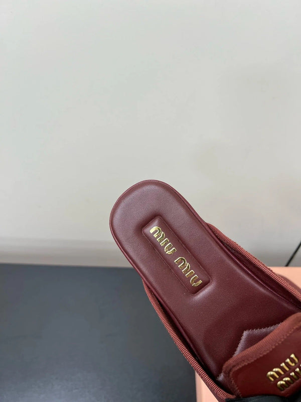 BOW MULES IN RED BROWN SHEEPSKIN