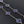 CLOVER 10 MOTIF SILVER PIETERSITE NECKLACE