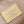 NOE PURSE 11.5 NANO CHARM CREAM PINK MONOGRAM CANVAS