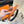 H GARDEN PARTY BELT 24MM SILVER BUCKLE & REVERSIBLE ORANGE AND BLACK LEATHER