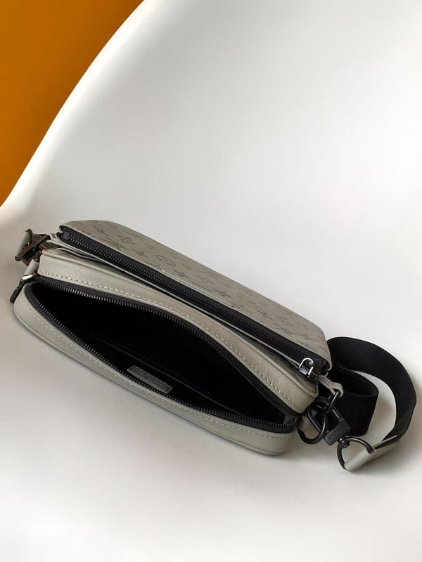 TRIO MESSENGER 25 IN GRAY MONOGRAM SHADOW CALFSKIN