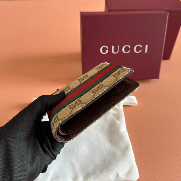 Gucci Bi-fold wallet Brown in Canvas 284913