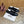 CE Macaron Triomphe Button Mules Ultra Black Leather 949378