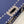 PEEKABOO ISEEU 33 IN NAVY BLUE GRAINED CALFSKIN SILVER HARDWARE