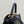 PEEKABOO ISEEU 27 IN BLACK SMOOTH CALFSKIN WITH WOVEN TRIM GOLD HARDWARE