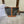 BUCKET 33 IN BLACK TRIOMPHE CANVAS AND BRONZE BROWN CALFSKIN TRIM