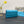 CARO SLIM POUCH 21 BAG IN SKY BLUE CALFSKIN