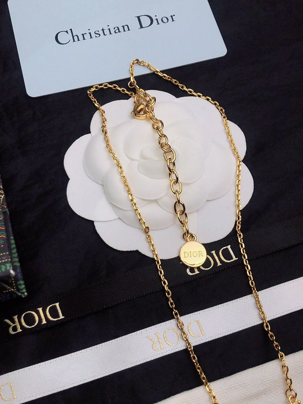 CD 26S CD Logo Crystal Station Necklace In Gold Tone Metal With White Crystal 631006