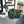 LOE MINI 18 PUZZLE BAG IN BOTTLE GREEN SATIN CALFSKIN