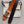HM BELT BUCKLE & REVERSIBLE BLACK AND ORANGE LEATHER STRAP 38MM SILVER HARDWARE