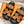 CHYPRE SANDAL BLACK AND BRIGHT BROWN LAMBSKIN