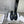 MARGARET CHUNKY LOAFER WITH FRINGES AND TRIOMPHE CHAIN IN POLISHED BULL GLOSSY BLACK