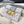 MONTAIGNE 19 HANDBAG IN GREY CALFSKIN