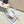 VLOGO SLINGBACK PUMP IN WHITE CALFSKIN LEATHER