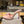 Prada 26S Open-Toe Mules 100mm in Blush Pink Patent Calfskin with Logo