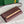 MONTE-CARLO PM CLUTCH 25 IN WINE RED GOYARDINE CANVAS