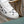 LV TRAINERS IN WHITE CALFSKIN AND MONOGRAM CANVAS