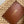 teen triomphe straw bucket bag 23cm raffia brown calfskin