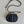 SIGNATURE 18 OVAL BAG IN BLACK CALFSKIN