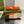 BLONDIE LOGO-PLAQUE LOAFERS IN TIGER ORANGE SUEDE