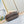 SAUMUR BB 20 BROWN MONOGRAM CANVAS AND LEATHER TRIM GOLD HARDWARE