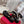 ROCKSTUD THONG SANDALS IN BLACK CALFSKIN