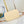 ALMA BACKPACK 20 IN BROWN MONOGRAM CANVAS AND BEIGE CALFSKIN TRIM GOLD BUCKLE