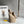 LOE MINI 19 PEBBLE BUCKET IN CAMEL BROWN MELLOW CALFSKIN