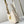 LOW KEY SHOULDER BAG 26 IN QUARTZ GRAINED CALFSKIN GOLD BUCKLE
