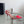 ALAIA HIGH 6 CM SLINGBACK IN CHERRY RED PATENT CALFSKIN AND FILM