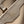 CAPUCINES BB 27 IN KHAKI BROWN TAURILLON GOLD HARDWARE