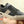 PRA TRAINER IN BLACK CALFSKIN AND TAN EMBROIDERED FABRIC