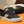 PRA TRAINER IN BLACK CALFSKIN AND TAN EMBROIDERED FABRIC