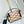 SIDE TRUNK 21 IN BEIGE RED LAMBSKIN WITH CRISS CROSS PATTERN GOLD HARDWARE