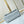 GO-14 MM 23 IN ECRUME GRAY QUILTED LAMBSKIN GOLD HARDWARE