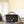 cc 24a flap bag 20cm top handle black  lambskin gold hardware