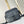 GETAWAY MESSENGER 18 IN GUN METAL MONOGRAM ECLIPSE CANVAS